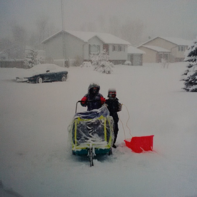 Another picture from the archives of my 2 oldest waiting patiently for either my wife and I to come out and walk with them while they delivered. Such tough warriors. Sunshine, rain, sleet, snowstorm they did their route. :)