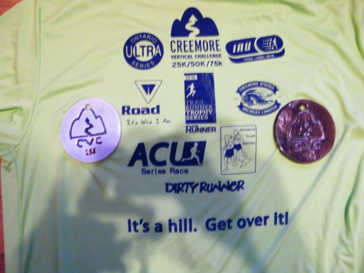My 2 medals, and the back of my Creemore Vertical Challenge shirt! :)